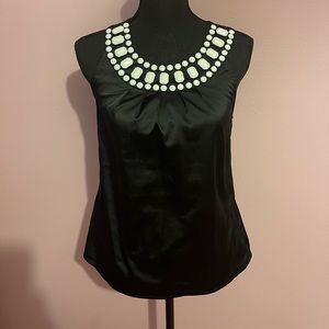 The limited top 96% polyester 4% spandex